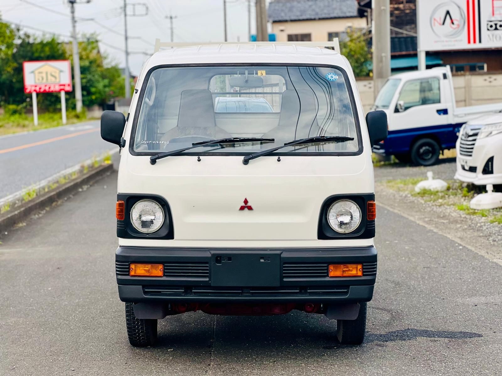1993 MITSUBISHI MINICAB dump truck in JACKSONVILLE, FL