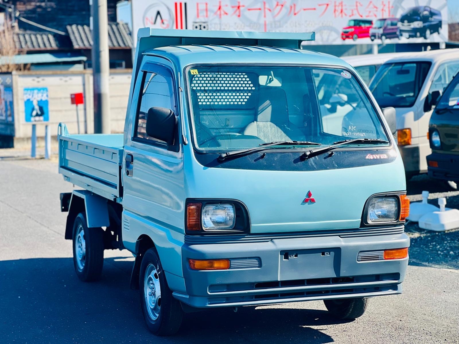 1996 Mit Dump truck  in JACKSONVILLE, FL