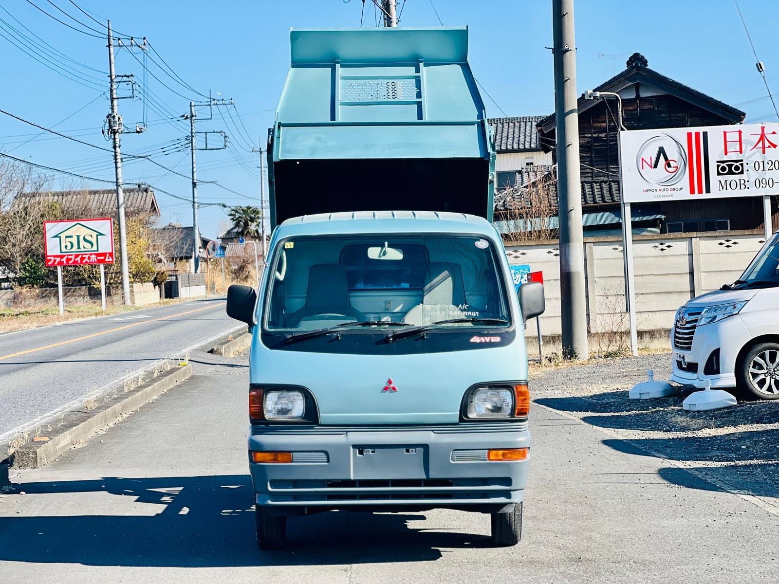 1996 Mit Dump truck  in JACKSONVILLE, FL