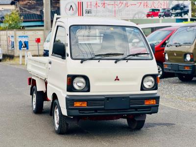 1993 MITSUBISHI MINICAB dump truck in JACKSONVILLE, FL